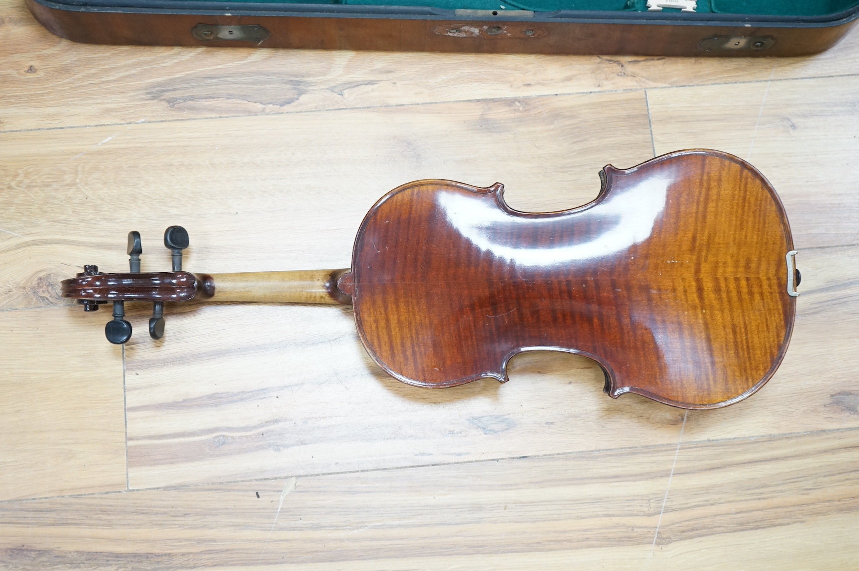 A cased violin, label to interior reads ‘Dulcis et Fortis’, back 36cm. Condition - scratches